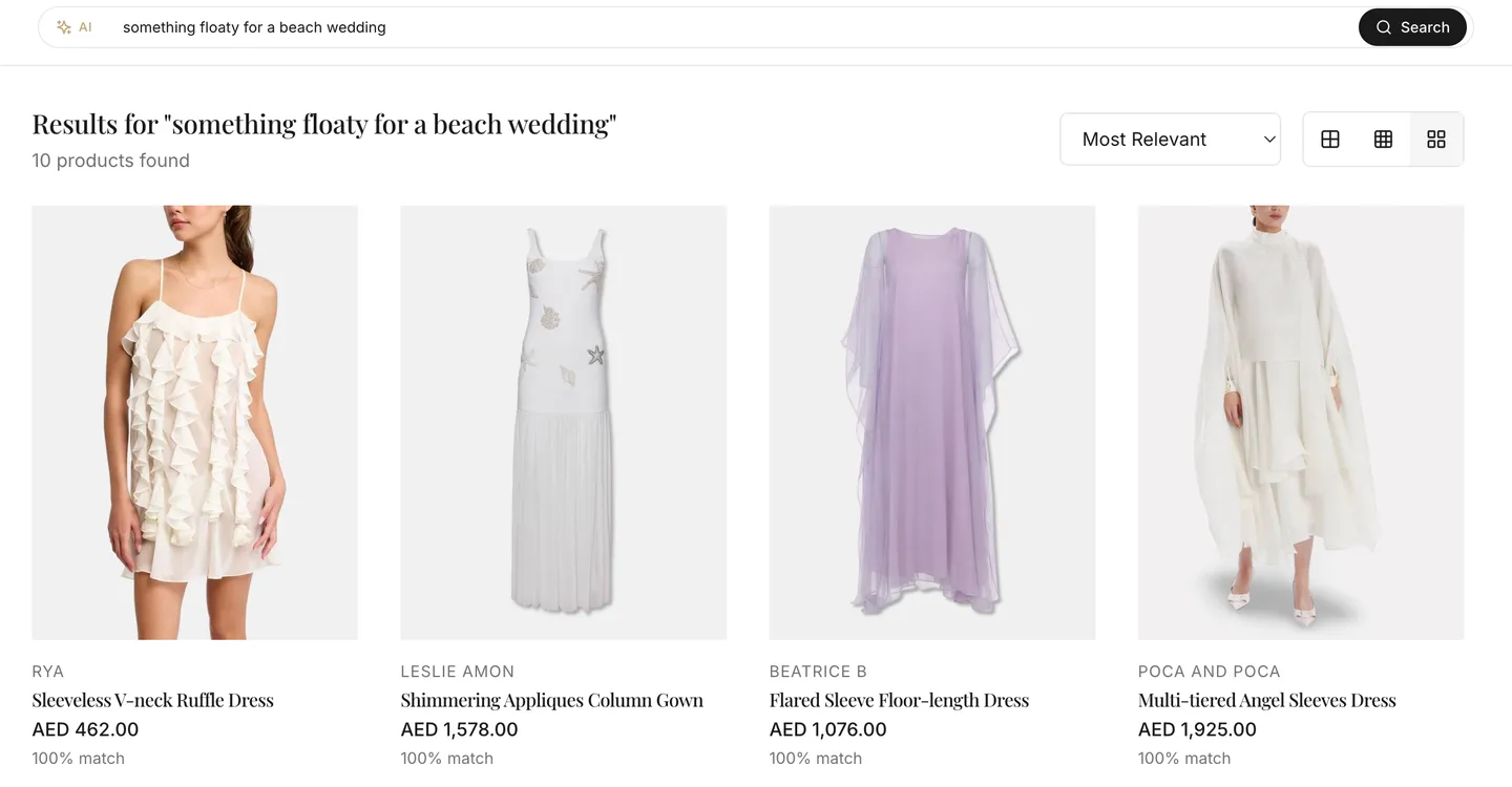 Live search results for “something floaty for a beach wedding”: a ruffle dress, a column gown, a lilac chiffon dress and a tiered white dress